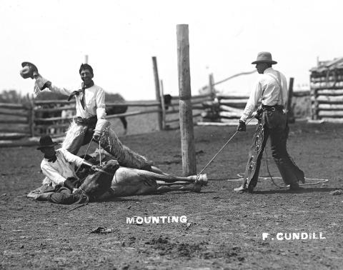 The posed antics of cowboys are a popular theme of many of Cundill’s photos.