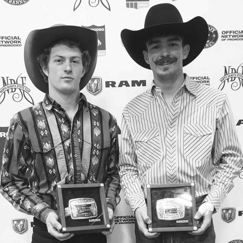 Chance Schott, right, of McLaughlin won the average championship in bull riding at the 2022 PRCA Badlands Circuit Finals Rodeo in Minot, Friday through Sunday, Oct. 14-16. In each of the four years he’s qualified for the rodeo, Schott has won either the year-end title or the average championship. At left, Jestyn Woodward of Custer claimed the circuit’s year-end bull riding title. Photo courtesy of Badlands Circuit Finals Rodeo