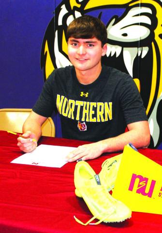Dupree High School senior JW Pederson, son of Bret and Cindy Sue Pederson, has accepted a scholarship and officially signed with the Northern State University cross country and track teams. Pederson will start his college career at NSU in the fall of 2024, where he plans on studying to become a chiropractor. Photo by Patty Peacock