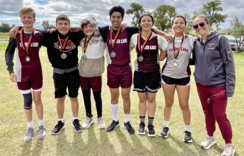 The Timber Lake cross country team had a big day at the Marlene Gustafson/Ryan Day Memorial Cross Country Meet in Faith on Friday, Sept. 5, with every member medaling in their division. (l-r) Gracen Gill, Ben Petersen, Mason Kraft, Theo Taylor, Cheyienna Nygaard, Tessla Taylor and Coach Alision Nilson.