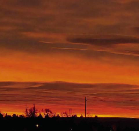 An orange sunrise sky over the region last week provided a breathtaking, vibrant display of color for those who were out of bed early enough to catch the morning spectacle to the east. The sunrise colors ushered in several days of mild winter weather after a week-long cold snap. Topic Photo/Jon Flatland