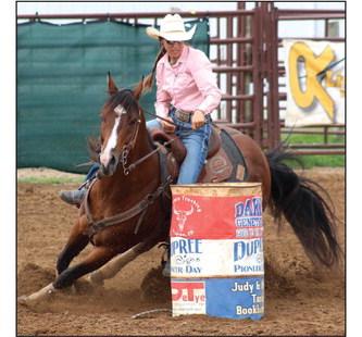 Minda Woodward of Dupree won the South Dakota Rodeo Association’s barrel racing championship this season. Besides top honors in barrels, she also finished third overall in ladies breakaway. Topic file photo by Jon Flatland