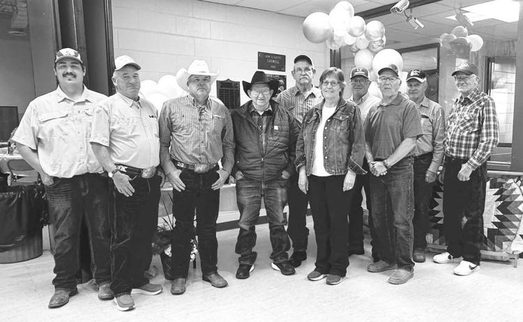 Dewey County Highway Dept. Secretary Cathy Lemburg was honored at a retirement party at Timber Lake on June 19. She was presented with a star quilt and other gifts by county employees, friends and family. Pictured above are present and former county highway department crew members. FRONT (l-r): Highway Supt. Will Wiedmer, Chuck Maher, Mitch Enright, Doc Pesicka, Cathy, Toby Reinbold; Back: Tom Hermes, Chip Long, John D. Boldt, and Lyle Richter. (More on page 6) Photo by Kathy Nelson
