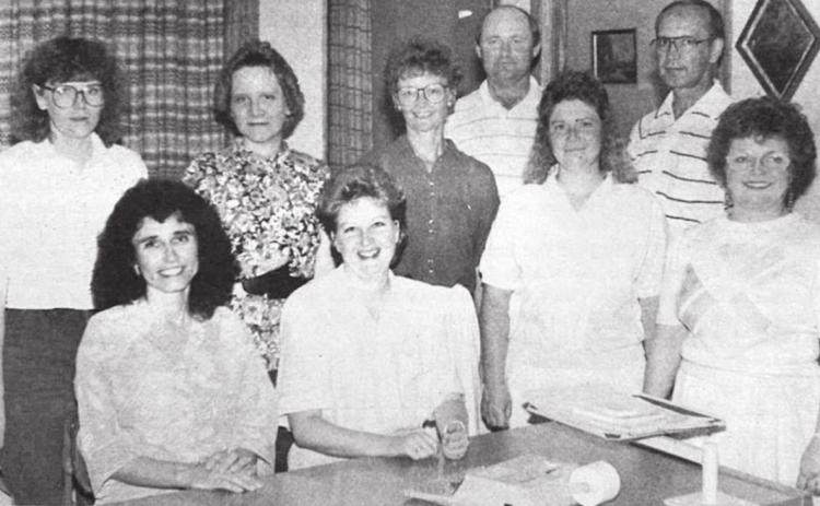 Personnel at Western Dakota Bank were pictured in an ad in the Isabel Dakotan on August 1, 1991. FRONT (L-R): Mattie Lou Doan, Monica Mayer, Marcia Maher, Pat Kjellsen; BACK: Diane Hahne, Karma Nash, Betty Strehlow, Butch Webb, Dan McKinnon.
