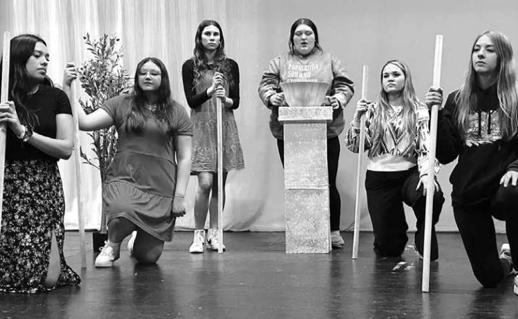 Actors in the Timber Lake High School one-act play, Madea, rehearse a scene where Madea (center, played by Anna Kraft) conjures up a poison to murder her former husband’s new wife. L-R are members of Madea’s chorus: Kessa Bigger, August Laurenz-Anderson, Natalie Lawrence, Katelyn Biegler, and Geana Bollinger. The play will be performed for the local audience on January 20 and enter the regional contest in Ipswich on January 22. Photo by Kathy Nelson