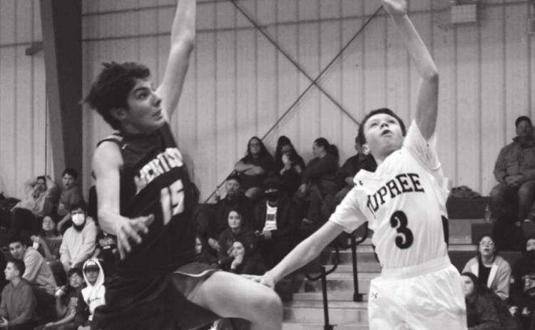 Klayte McLellan, in the ninth grade, had McIntosh’s Ashton Walker on his tail as he was making points for Dupree’s JV team as they beat the McIntosh Tigers 51 to 15. Photo by Patty Peacock