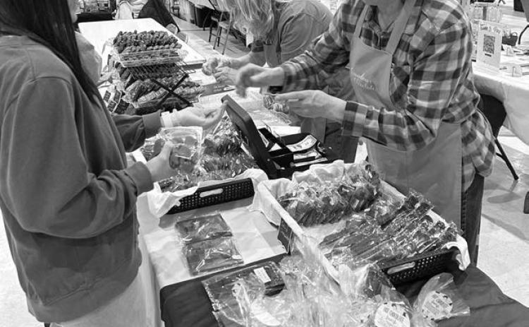 Ann Abel, owner of Grandma’s Chocolates in Lemmon, was among the vendors at the annual Isabel Holiday Craft Fair on Sunday, Dec. 1, at the Isabel Community Center. Abel’s handmade chocolates are a favorite among show shoppers. Photo by Jon Flatland