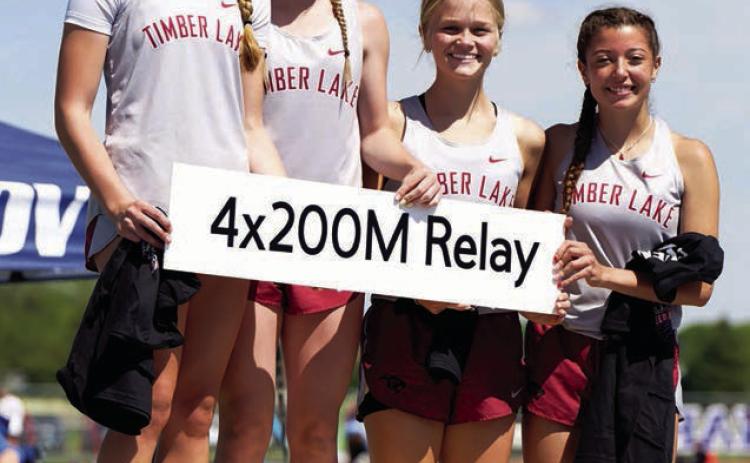 Setting new school records and qualifying for the State Class B Track Meet this week in Brookings is the Timber Lake girls 800 meter relay squad consisting of Josie Boldt, Korbi Heck, Hailey Roggow and Arianna Bieber. The group set a new school mark with a time of 1:50.04 this season. Photo by Marie DuPreez
