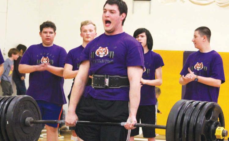 The Dupree High School Powerlifting Team recently held an exhibition fundraiser that included a meal and each member of the team completing three different lifts as they would in a competition. Many of the team members set personal bests at the event. Pictured, Matthew Lemke lifts 535 pounds as teammates Wyatt Lemke, Case DePoy, Joseph Brewer and Rio De La Rosa look on. Photo by Patty Peacock