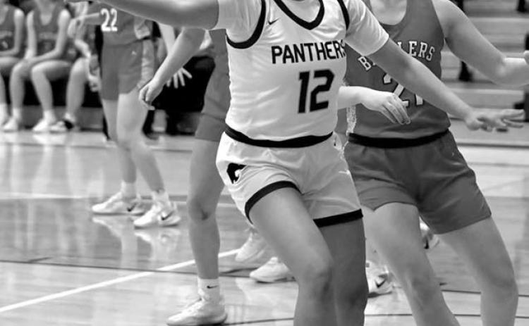 Senior forward Kessa Bigger (12) chases down a rebound during Timber Lake girls basketball action against the Potter County Battlers last Friday, Jan. 10. Timber Lake won 54-47.