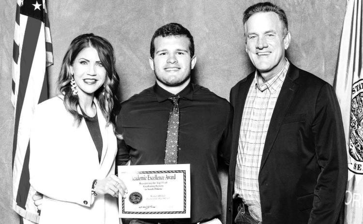 Timber Lake High School’s top senior, Sawyer Holzer, with Gov. Kristi Noem and Lt. Gov. Larry Rhoden