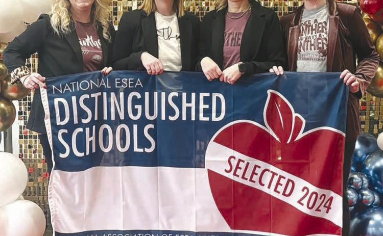 Accepting the National ESEA Distinguished School Award on behalf of the Timber Lake Elementary School at a ceremony in Austin, TX, last week were (l-r) Elementary Principal Danae Paxton, fifth grade teacher Kaitlyn Mendoza, Kindergarten teacher Theresa Keller, and Reading Specialist Alision Nilson.