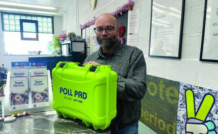 Dustin Van Balen of KNOWiNK shows off the new Poll Pad system that will replace the traditional paper poll book at Dewey County voting precincts starting with the June 2 Primary. The Dewey County Board of Commissioners voted 4-1 last week to implement the system.