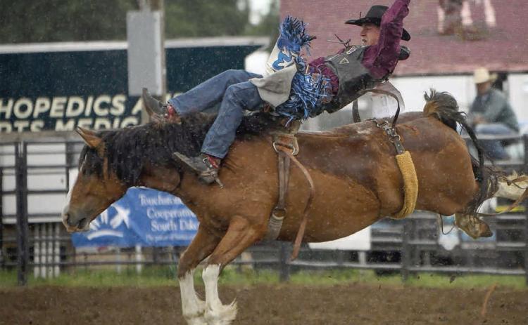 Cooper Schuelke of Faith earned a third place finish in saddle bronc riding at the SD High School Finals Rodeo in Ft. Pierre last week, advancing him to the National High School Finals Rodeo slated July 19-25 in Lincoln, NE. Photo by Chuck Miner