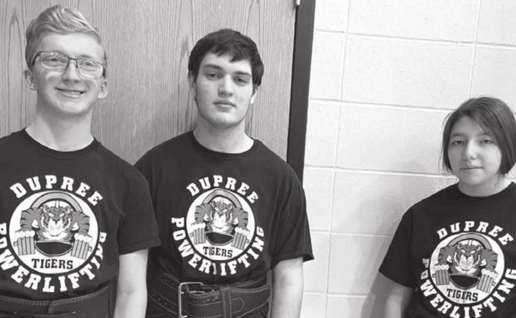 Three members of the Dupree HS powerlifting team traveled to competition in Brandon Valley on Saturday, Jan. 29, included (l-r) Case DePoy, Matthew Lemke and Nevaeh Farlee. Farlee was the lone medalist for the team, finishing second overall in the girls’ 7th Division weight class. Photo by Patty Peacock