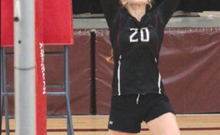 Senior Kendyl Locken of Timber Lake sets a shot for one of her hitters during the Lady Panthers match against Dupree in the Little Moreau Conference Volleyball Tournament on Saturday, Sept. 23. Photo by Jon Flatland