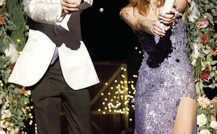 Jackson Bigger and Jaycie Lemburg fire confetti in the air during the Grand March at Timber Lake High School’s 2025 Prom on Saturday, April 26. Watch next week’s Topic for more TLHS Prom photos and look in this issue for photos from the Dupree High School Prom. Photo by Chuck Miner
