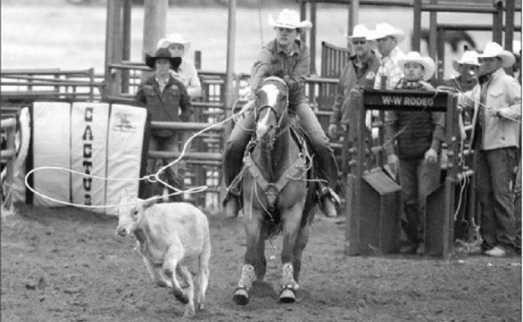 Bailey Donner makes a perfect throw during ladies breakaway roping at the Isabel Rodeo. The Morristown cowgirl finished in a tie for second place in the event with a 3.0 second run to collect a $992 check. Donner is currently fourth in the SDRA’s season ladies breakaway standings. Photo by Jon Flatland