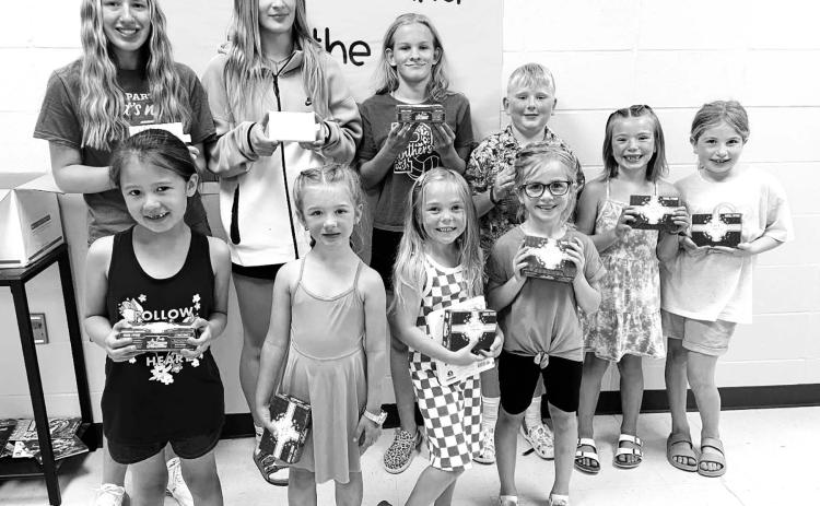 Prize drawing winners who met their Accelerated Reader goals: Front (l-r): Blakely Brown Otter, Lakyn Lindskov, Charlie Long, Elsie Maher, Brie Parker, Rose Maher; Back (l-r): Kamee Mareska, Jaycie Lemburg, Brynn Lemburg, Isaac Schweitzer.