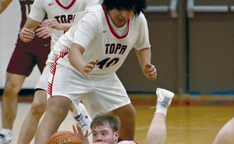 Timber Lake Panther senior Treyton DuPreez dives for a loose ball in front of Tiospaye Topa’s Steven Garnette during boys hoops action on Saturday. The Panthers are 6-2 and riding a five-game win streak into meetings with Herreid-Selby on Thursday, Jan. 16, and winless Aberdeen Christian in Redfield on Saturday, Jan. 18. Find more sports on Pages 8-10 and 12. Photos by Marie DuPreez