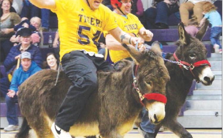 Dupree HS senior Bubba Marshall (left) screams commands to an uncooperative partner during a Donkey Basketball fundraiser presented by the DHS Post-Prom Committee last week. Photo by Patty Peacock