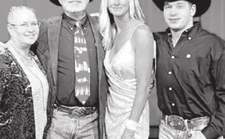 Michelle Alley and her brother, J.J. Alley (RIGHT) with Paul and Traci Brown (AT LEFT) when Michelle was inducted into the Hill College Athletic Hall of Fame. Michelle and J.J, are children of Robert Alley of Isabel. Paul Brown was her rodeo coach at Hill College.