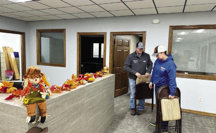 Rusty Gebhardt recruited his school teacher wife Shanna to help with the move into the recently-completed new Western Dakota Bank building last weekend. Employees and volunteers worked through the weekend for the opening on Monday, October 16. A grand opening will be announced later.
