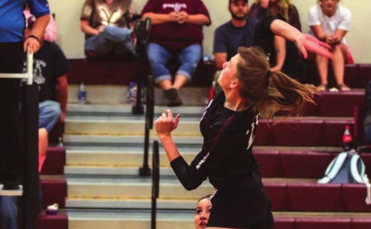 Molly Kraft rises to spike the ball during the Panthers’ game versus Bison last week in Timber Lake. Photo by Jon Flatland