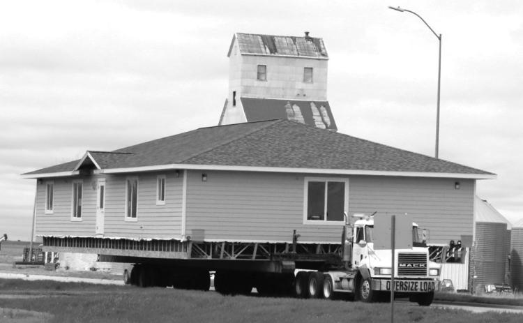 Traffic moved over for a wide load that passed through Isabel and Timber Lake last week. The structure was reportedly on its way to McLaughlin or Fort Yates for use as an ambulance and emergency services building.
