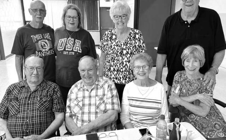 A small but enthusiastic group from the Timber Lake High School Class of 1961 had a reunion on July 25. Attending were (front, l-r) Dan Holzer, Bob Silbernagel (his wife, JoAnn, behind him), Bonnie McMacken Yuker, LarryTompkins and his wife Ann (in front); Back: Ken “Buddy”Paul and wife Lavonne. Photo by Kathy Nelson