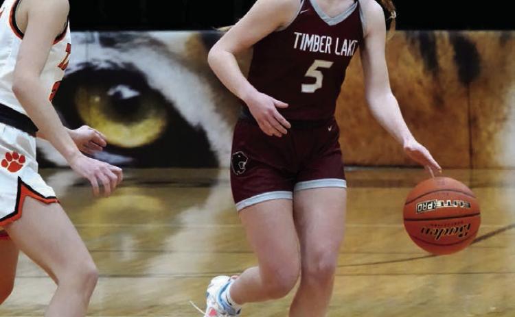 Senior guard Averie Marshall (5) brings the ball into the front-court for the Timber Lake Lady Panthers during recent girls basketball action. The Lady Panthers will play in the Little Moreaeu Conference Tournament this week. The tournament bracket had not been released by the time this issue of the Topic went to press. Photo by Marie DuPreez