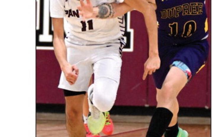 Timber Lake senior Tristan Dupris (11) is fouled by Dupree’s Jayden Taken Alive (10) during non-conference boys basketball action earlier this season. The Panthers close out their regular season schedule on Friday Feb. 23, against Potter County in Gettysburg. Photo by Marie Du Preez