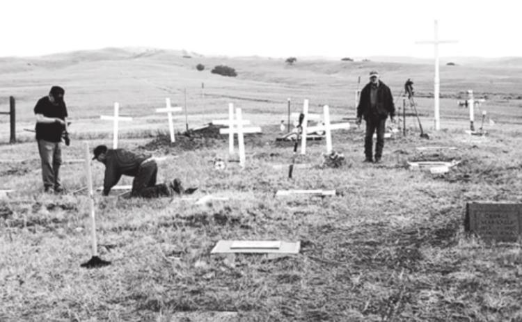 ABOVE: Members of the Knights of Columbus Council 6537 of Faith, Dupree and Eagle Butte installed headstones on several unmarked graves at the Immaculate Conception Cemetery in Bridger. Contributions from the Sibyl Lone Eagle family of Bridger helped make the restoration work possible.