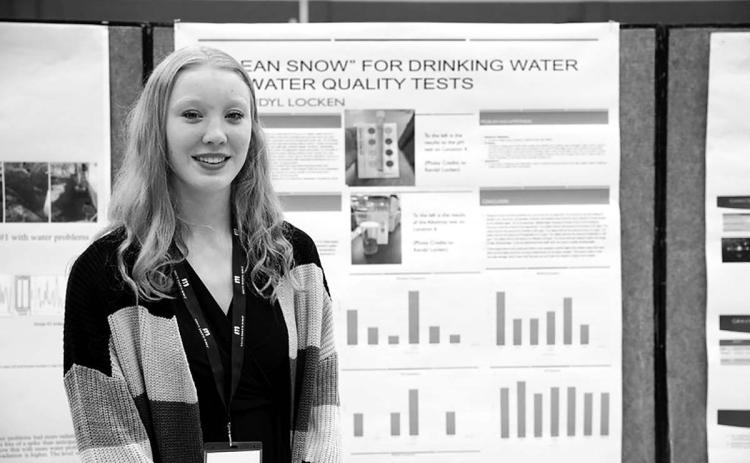 Kendyl Locken with her project at the High Plains Regional Science Fair.