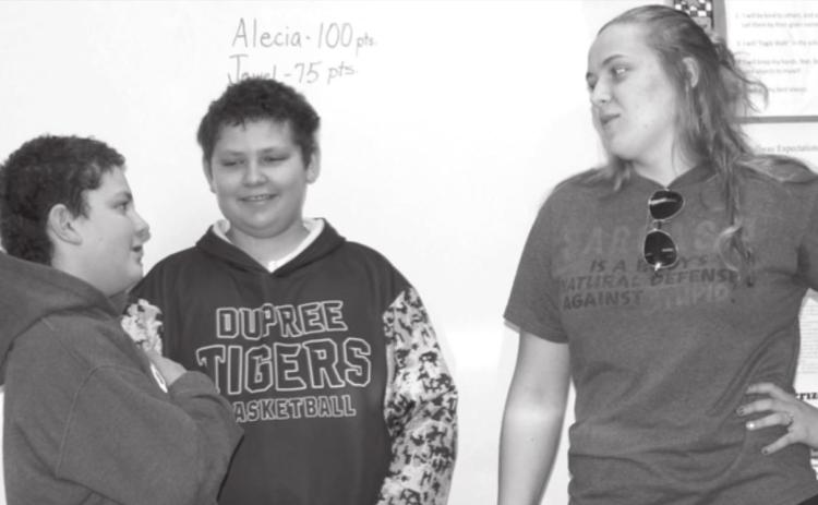 Maverick and Wyatt Lemke role playing on how to say no to vapes being offered to them by an older student, played by their sister Erin Lemke, for the second grade students. Photo by Patty Peacock