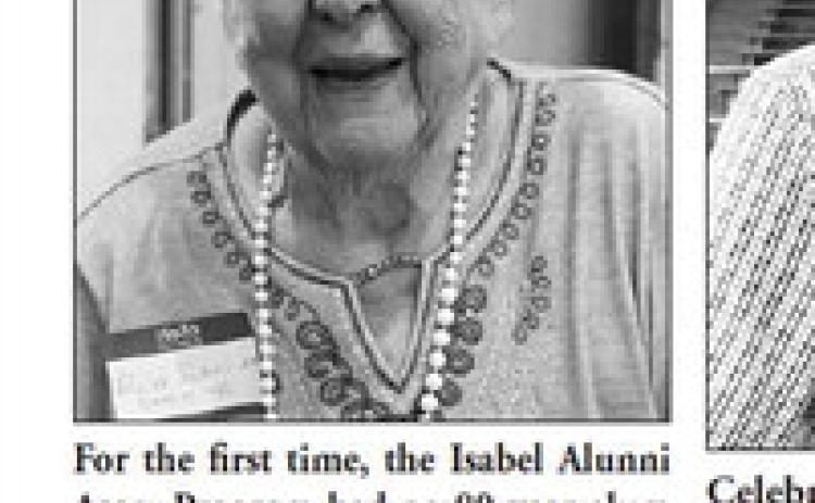 For the first time, the Isabel Alunni Assn. Program had an 80 year alum come to the event. Ruth Ehrenberg Schmidt graduated in 1942. Isabel Alumni Assn. President Marcia Maher and Emcee Brook Begeman presented her with a commemorative quilt.