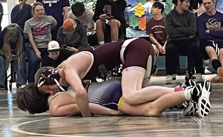 Timber Lake’s Taggen Paxton rides his opponent in a match at the Harding County Wrestling Invitational on Dec. 30. Paxton was 9-8 heading into the tournament and split four matches, moving to 11-10 on the season. Photo by Denise Perryman
