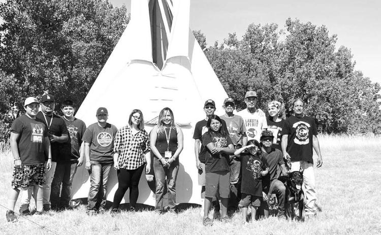 Participants in the Summer Lakota Camp at Green Grass were (L-R) Nation Cowins, Wendell Nezzie, Daven Roberts, Ryanne Nezzie, Macey Ward, Danielle Reynolds, Dylan Ashley, Garland Not Afraid Sr., Wakinyan Chief, Reed Two Bulls, Waylon Gaddie and (front and kneeling) Blaze and Lyndon Gaddie and Labon Red Owl.