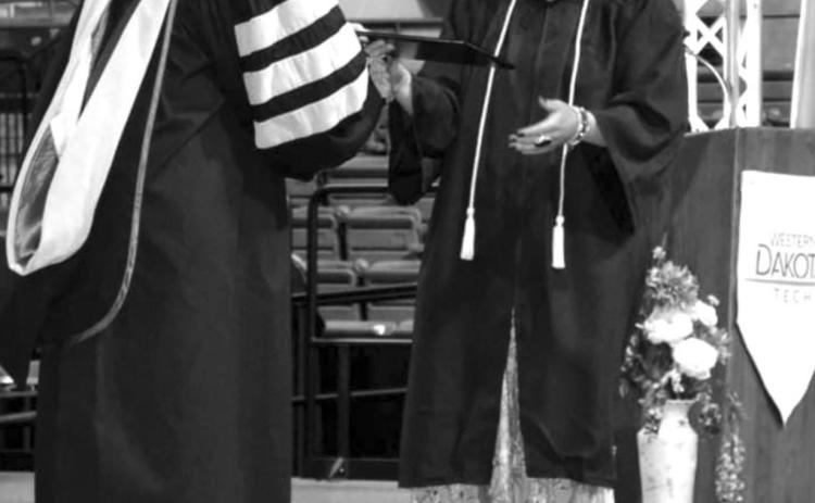Taylor earns degree