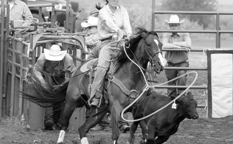 Sloan Anderson of White Horse came out of the gate firing during the ladies breakaway competition at the Days of 1910 Rodeo. Unfortunately for Anderson, her rope missed its mark and she took a no-time to end her day. Photo by Jon Flatland