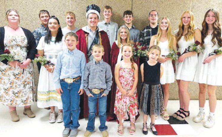 RIGHT: The Timber Lake High School Homecoming Royal Court. Front (L-R): Brody Kraft, Crawford Maher, Lizzie Keller, Mya Peterson; MIDDLE: Serenity Webb, Taylor Peterson, King Dan Peterson, Queen Kenlea Heck, Averie Marshall, Kendyl Locken, Sara Holzer; BACK: Jayden Goldade, Gracen Hansen, Kyler Bollinger, Carter Keller, and Mason Arpan. BELOW: Classes display “Panthers are Soooo Sweet” theme for the parade. Parade photos by Jon Flatland Photo by Kathy Nelson