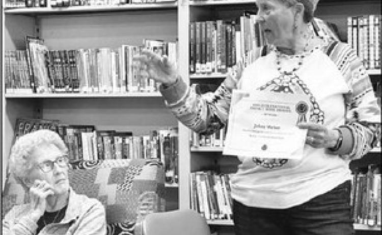 Local author receives another book award
