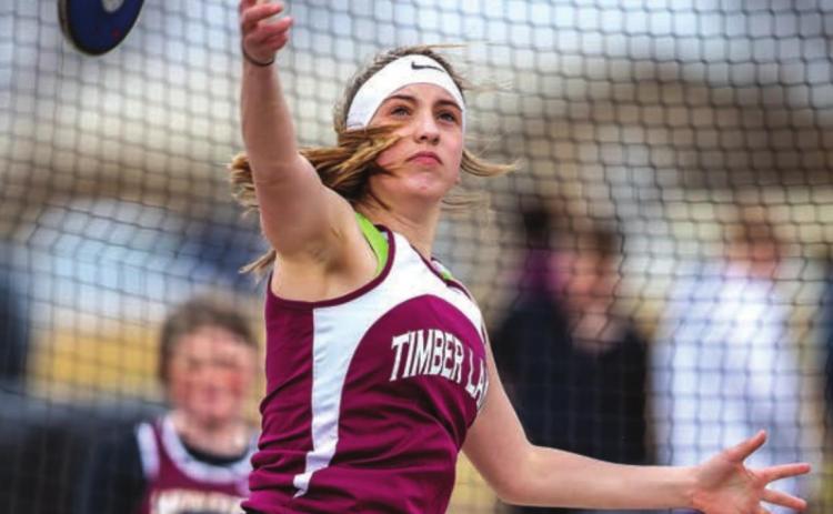 Mckenzi Vomacka launches a discus in junior high track meet action. The TL JH girls won the conference meet. Photos by Robert Slocum