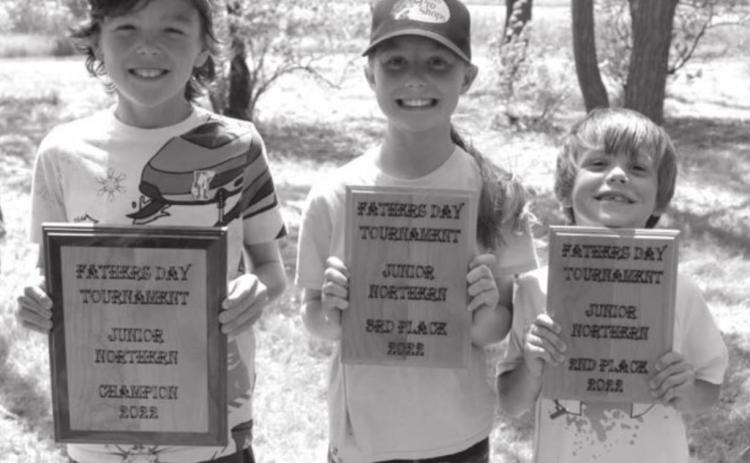 Plaque winners in the fishing tournament at Isabel Lake on Saturday were (l-r) Hayden Bader, first place; Hailey Bader, second place; and Michael Bader, third place.