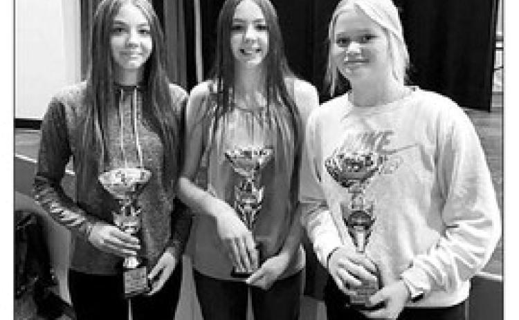 Top Freshmen (L-R) Gailup Bollinger, Geana Bollinger, and Hailey Roggow all earned a straight A average for the year.