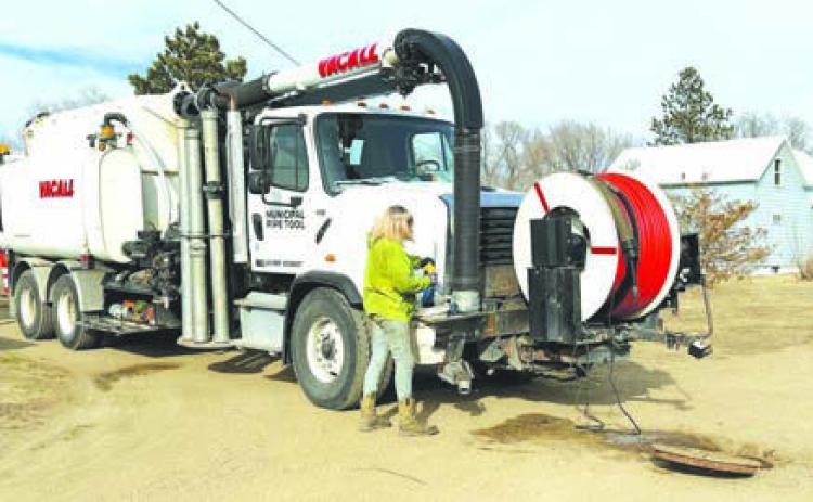 Techs from Municipal Pipe Tool Co. were cleaning sewer lines March 11 but the work was interrupted after several residents had sewer back-up in their homes.