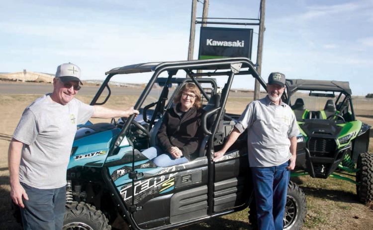 Schmeichel’s Repair in McLaughlin is marking its 50th anniversary as a Kawasaki dealer. Pictured are (l-r) Dan Schmeichel, Pattie Schmeichel and Harvey Schmeichel. Founder Lester Schmeichel became a Kawasaki dealer in 1972 and the dealership remains a mainstay in the region today. Photo by Jon Flatland