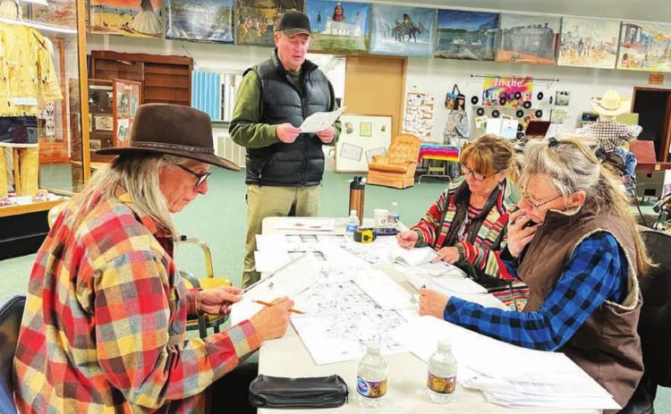 Plans for redesigning the Native American exhibit at the Timber Lake &amp; Area Museum are the focus of a committee working with Dr. Craig Howe (LEFT) of the Center for American Indian Research and Native Studies at Martin. Committee members are L-R Jeff Mowrer, Lori Ward, and Melody Marshall.