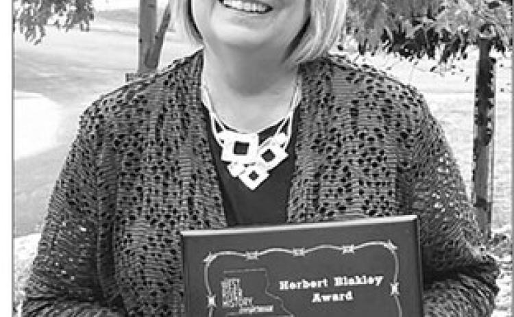 The West River History Conference honored Karen Dahlgren Holzer, formerly of Timber Lake, with the Herb Blakely Award in recognition of her work in local and regional history.
