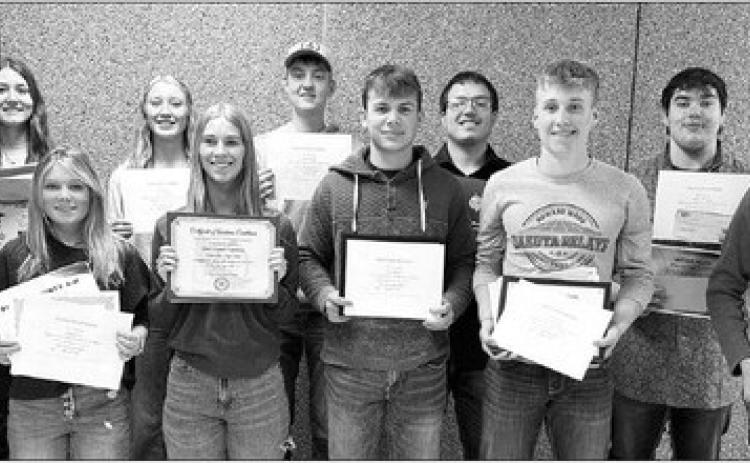 These 11 TLHS seniors received scholarships for higher education, announced at Awards Day on May 8. FRONT (l-r) Shawn Quinn, Kenlea Heck, Averie Marshall, Carter Keller, Gracen Hansen, Tristan Dupris; BACK: Sara Holzer, Kendyl Locken, Kyler Bollinger, Dan Peterson, and Mason Arpan.
